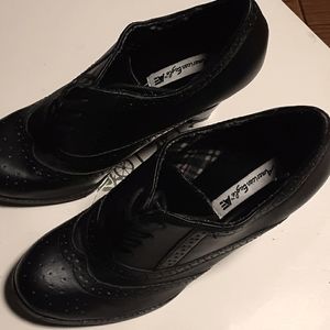 American Eagle (ae) s-7 high heeled mini boots.